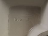 a close up view of a toilet with the lid down