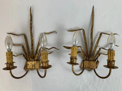 pair of antique brass wall sconces with leaves and candles