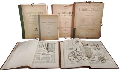 several old books are sitting on top of each other on a table