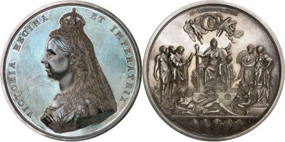 an image of a silver coin with a picture of a woman on it