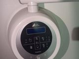 a close up of a control panel in a bathroom