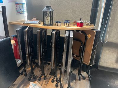 a lot of skis that are sitting on a table