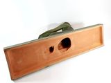a piece of wood that has a hole in it
