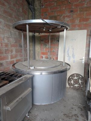 an image of a kitchen with a stove, oven, and sink