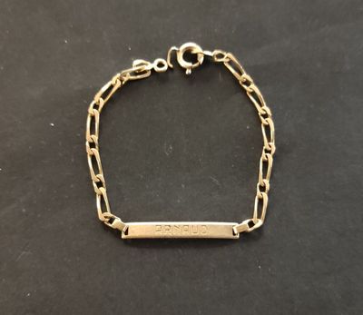 Gourmette en or 18K (poinçon tête d'aigle), le fermoir en mé… - Photo 1