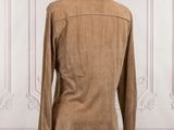 the back view of a tan jacket on a mannequin mannequin mannequin mannequin mannequin mannequin mannequin manne