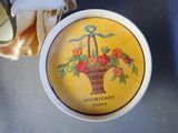 a picture of a plate with a basket of flowers on it