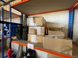 many boxes on the shelves in the warehouse