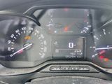 a close up of a car dashboard with a speedometer and gauges