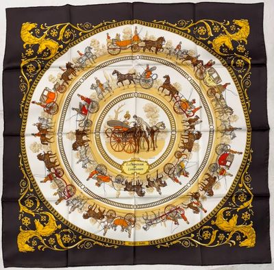 a close up of a square scarf with horses and carriages on it