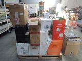 many boxes stacked on top of each other in a warehouse
