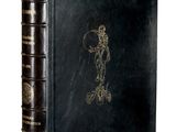 an old book with a drawing of a man on it