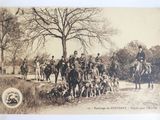 an old photo of a group of men riding horses