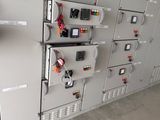 many electrical switches on the wall in the room