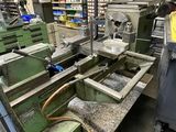 a machine that is working on a piece of metal
