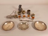 a lot of silver items that are on the table