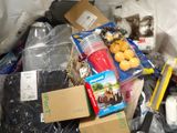 a pile of items that are sitting in a trash can