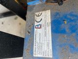 a close up of a piece of metal with a label on it