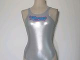 a mannequin with a silver bodysuit on a mannequin stand