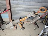 a small machine that is sitting in the garage