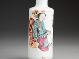 an image of a white vase with a painting of a man sitting on a chair