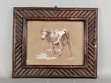 tableau représentant une vache, encadré et accroché au mur