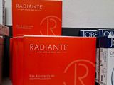 several boxes of radiante are stacked on a shelf in front of a white wall