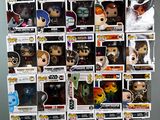 a lot of pop vinyl figures on display on the table