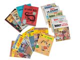 de nombreux livres pour enfants qui se trouvent sur la table
