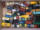 a box full of toy cars and trucks in it