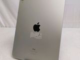 the back of an apple ipad with a sticker on it