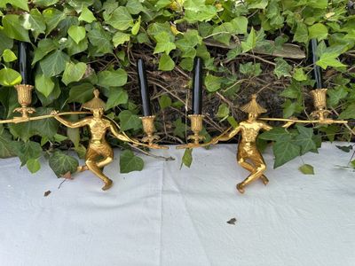 four candles that are sitting on a table