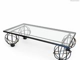 an image of a coffee table with wheels and a glass top