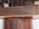 a close up of a wooden table with a wooden top