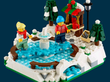 a lego snow scene with a fountain in the middle of it
