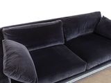 an image of a black velvet couch in a living room