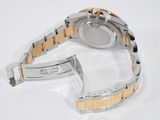 an image of a close up of a watch on a white surface