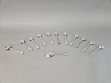 a lot of spoons and spoon spoons arranged in a circle