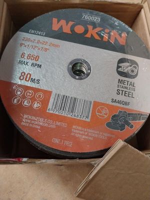 an image of a metal grinding wheel in a cardboard box