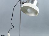 a lamp that is sitting on a table next to a charger