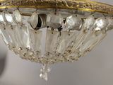 a chandelier hanging from the ceiling in a room