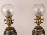 two lamps that are sitting on top of a table