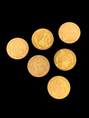 six gold coins are arranged in a triangle on a black background
