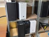 a shelf that has a lot of electronics on top of it