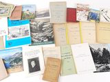 a lot of books that are sitting on a table