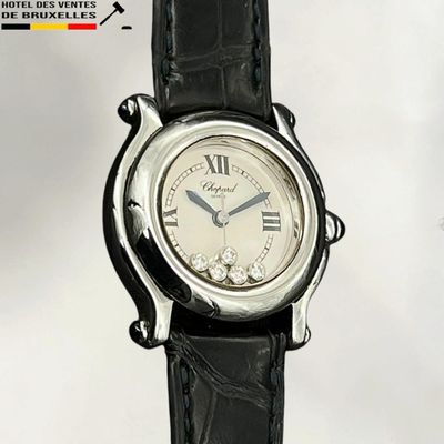 an image of a wrist watch with roman numerals on it