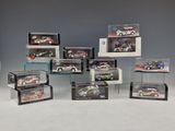 a lot of different models of cars in display cases