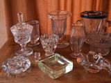a table with a lot of glass items on it