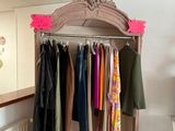 an image of a clothing rack in a clothing store