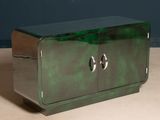 an image of a green metal cabinet with two doors and a handle